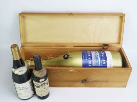 A magnum of Troken Sekt sparkling wine, for The Friends of HMS Vidal reunion, a bottle of Crozes