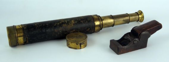 A 19th century brass and leather three drawer telescope, together with a steel plane stamped James