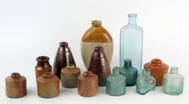 A collection of assorted pottery ink bottles, and glass bottles. (a lot).