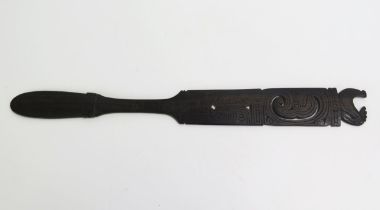 A Massim lime spatula, Trobriand Islands, Papua New Guinea, the handle surmounted with a bird,