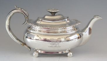 A George III silver barge-shaped teapot, maker Charles Fox I, London, 1819, crested, with