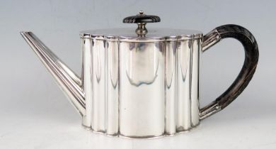 A Victorian silver bachelors oval teapot, maker Hukin & Heath, London, 1888, inscribed, of lobed