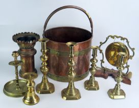 A pair of 19th century brass candlesticks, a brass and copper bucket, a brass gong, a Chinese
