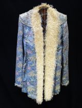 A vintage Afghan style coat, with Chinese silk? landscape pattern.