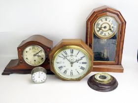 A 1920's mahogany mantel clock of arched outline, an American mantel clock, a wall timepiece,