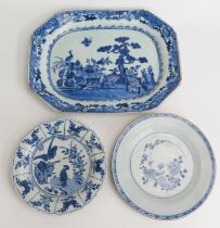 A Chinese blue and white rectangular serving dish, decorated with birds in a garden landscape,