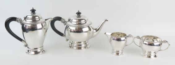 A George V silver four-piece tea service, maker William Neale, Birmingham, 1926, of ovoid form