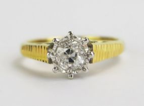 An 18ct Gold and Diamond Solitaire Ring, c. 4.1mm illusion set stone, size I.5, hallmarked 3.31g