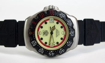 A TAG Heuer Professional Quartz Wristwatch, c. 35mm case, back no. 371.513. Running