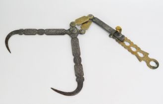 A late 18th century steel and brass cantilever roasting spit jack, with height adjusting bracket,