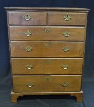 An 18th century oak chest in two parts, of rectangular outline containing two short and four long