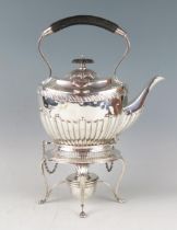 An Edward VII silver tea kettle, stand and burner, maker Charles & George Asprey, London, 1905, of