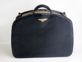 A Bentley stitched leather travelling case, with Bentley winged logo, with two compartments,