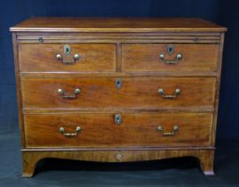 A George III mahogany chest, the rectangular top with a moulded edge, with brushing slide,