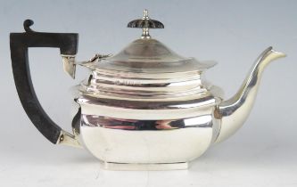 An Edward VII silver bachelors teapot, maker William Aitken, Birmingham, 1907, of barge-shaped