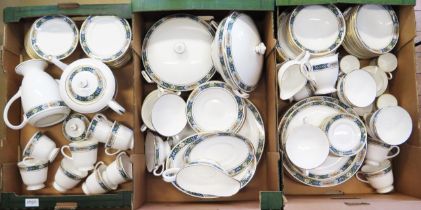 An extensive Royal Worcester part dinner, tea and coffee service with "Manor House" transfer print
