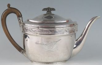 A George III silver oval teapot, maker John Emes, London, 1801, crested, with banded floral