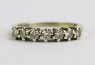 A 9ct White Gold and Diamond Half Eternity Ring, continental marks, .33ct, size K.5, 2.52g
