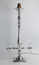 A Masonic silver plated four branch table lamp, inscribed, with clear glass sconces. 48cm high,