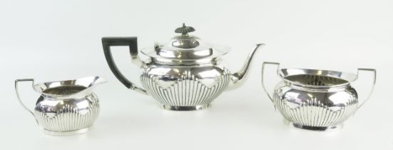 A George V silver three-piece tea service, maker Thomas Ellin & Co Ltd, Sheffield, 1912, of oval