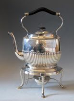 A late Victorian silver tea kettle, stand and burner, maker Carrington & Co, Birmingham, 1892,