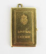 A 9ct Gold Driving Licence Charm hinged to open, hallmarked, 2.38g