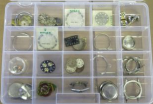 A Selection of ROLEX Parts including movements and dials, etc.