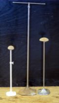 Two vintage adjustable hat stands, together with an adjustable scarf stand. (3)