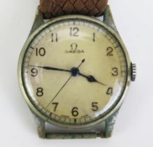 A WWII OMEGA Military Wristwatch, 33.5mm case, the back marked "H.S. ?8 4396?, inside case back