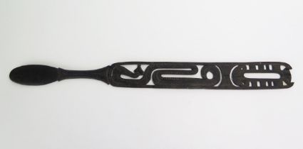 A Massim lime spatula, Trobriand Islands, Papua New Guinea, the handle with pierced geometric and