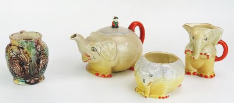 A Royal Venton ware pottery three-piece tea set modelled as elephants includes tea pot, cream jug