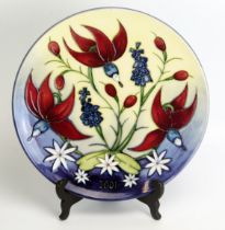 A Moorcroft pottery limited edition year plate '2001' by Nicola Slaney, No 41/750, 22.5cm diameter.