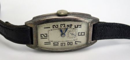 A Silver Cased Wristwatch with Elem six jewel manual wind wristwatch, London 1929 import marks.