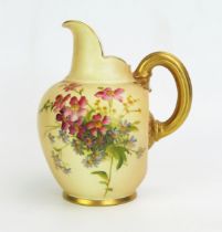 A Royal Worcester blush ivory cream jug, with painted floral spray decoration heightened in gilt,