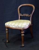 A Victorian mahogany hoop back campaign chair, to a standard Ross & Co design, with four
