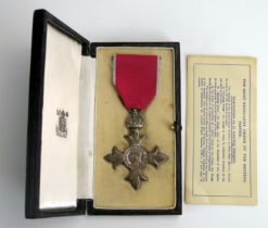 A George V M.B.E. (Civil) contained in its original case with paperwork.