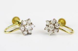 A pair of Diamond Seven Stone Cluster Earrings, unmarked precious yellow and white metal screw