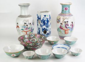 A modern Chinese porcelain vase, of baluster form decorated with female figures in a garden