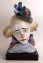 A Lladro bust, 'Pensive Clown', model 5130, printed mark, height 27cm. (chipped bowler hat