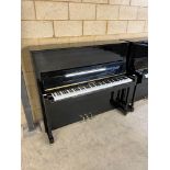 Hoffmann (c2014) A Model T128 upright piano in a bright ebonised case.