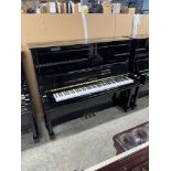 Yamaha (c1993) A Model U30A 131cm upright piano in a traditional bright ebonised case. There is