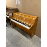 Schimmel (c1962) A Model 108 upright piano in a satin cherry case with plexiglass keyboard fall.