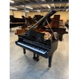 Steinway (c1988) A 5ft 10in Model O grand piano in a bright ebonised case on square tapered legs.