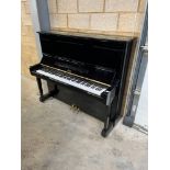 Boston (c2000) A Model 132 upright piano in a bright ebonised case.