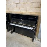 Steinway (c2003) A Model V upright piano in a bright ebonised case.
