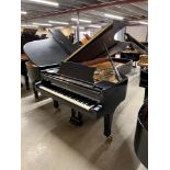 Steinway (c1989) A 9ft Model D grand piano in a satin ebonised case on square tapered legs.