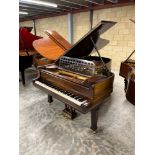 Steinway (c1910) A 6ft 11in Model B grand piano in a rosewood case on square tapered legs.