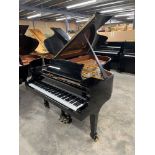 Steinway (c1997) A 6ft 11in Model B grand piano in a bright ebonised case on square tapered legs;
