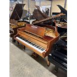 Zimmerman (c1988) A 4ft 6in grand piano in a bright mahogany case on square tapered legs.