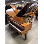 Steinway (c1921) A 5ft 10in Model O grand piano in a rosewood case on square tapered legs;